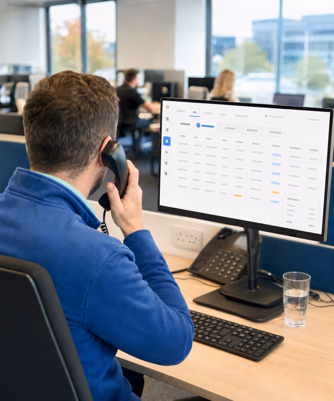 A back-office team running multi-channel order intake on RouteMagic, with phone, EDI and portal orders flowing onto a unified order screen.