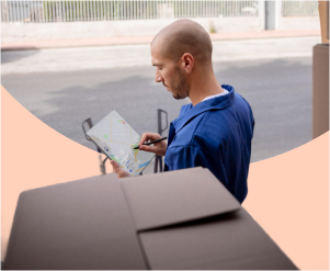 Professional delivery driver using tablet for route optimization and real-time logistics tracking