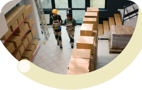 Warehouse shelving with organized inventory boxes for wholesale distribution management