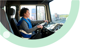 Adapt and Scale Your Business: Van sales driver using mobile device in delivery vehicle cab for scalable fleet management and business growth automation