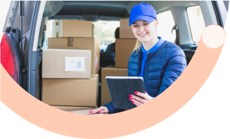 Improve Cash Flow: Van sales worker in blue uniform organizing packages in delivery vehicle for faster payment processing and improved cash flow