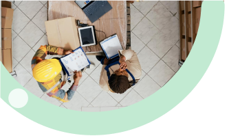 Take Full Control and Streamline Your Operations: Warehouse team using mobile devices and laptops for comprehensive operations control and workflow automation