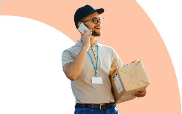 Work With Us: A delivery person talking on the phone looking happy