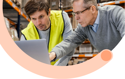 Compliance & Batch Traceability: Food safety inspector in yellow hard hat conducting batch traceability checks and compliance monitoring in food processing warehouse
